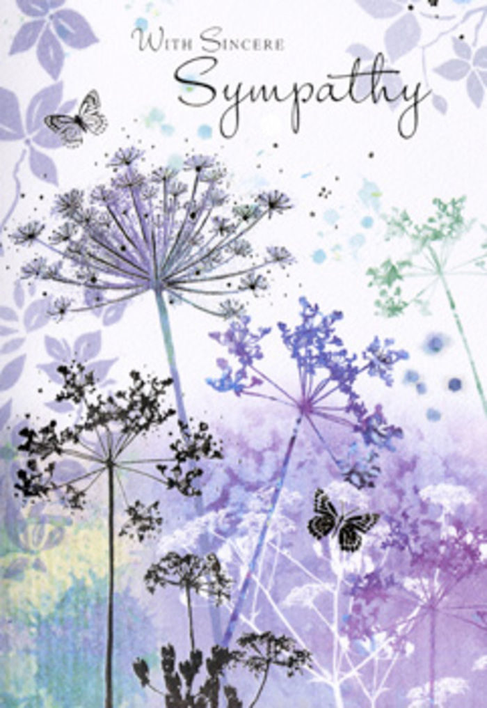 This sympathy card features a delicate botanical scene, painted in a palette of soft violets, muted purples, and hints of silvery green that bring to mind the calming tones of local gardens in Collier Row after a light rain. Slender wildflower stems climb gracefully from the base, each supporting a spray of umbelliferous blooms that open into finely detailed, lace-like clusters. The individual florets are suggested with gentle, almost whispering strokes, creating a sense that the blossoms might sway if you were to breathe too close. Behind them, a wash of blended watercolour drifts across the surface, fading from cool lavender to pale grey-green. This softly blurred background could be read as distant foliage, low-lying mist, or simply a comforting haze, leaving plenty of room for the viewer's imagination. Butterflies appear among the flowers, their wings delicately tinted with light lavender and cool blue, the edges fading into the air. They seem to hover without effort, introducing a feeling of quiet hope and continuity. Serving Collier Row as a florist, I often see how such gentle imagery resonates with those choosing cards and flowers in times of loss - it's not about dramatic colour, but about reassurance and respect. The arrangement of stems, blossoms, and butterflies creates a rhythm of vertical and floating lines, guiding the eye upward in a calm, unhurried way. Overall, the card conveys a mood of reflective stillness, suggesting that amidst sorrow, nature holds a place where memories can rest softly, surrounded by beauty that does not demand attention yet remains steadfastly present.