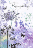 On this sympathy card, a softly rendered meadow scene unfolds in subtle layers of violet, lavender, and silvery green, echoing the gentle, understated charm of Collier Row's quieter corners. Tall umbelliferous flowers grow in graceful clusters, their thin stems bending with a suggestion of breeze, each topped with intricate, airy heads that resemble tiny stars gathered together. The artist has used delicate, almost translucent strokes to define the tiny florets, so they seem to glow against the pale, watercolour background. This backdrop is a blend of diffused purples and green-grey tones, neither fully sky nor field, but rather a soothing mist of colour that supports the central flowers without competing with them. Butterflies drift among the stems, their wings only lightly defined, brushed with a hint of pale blue and soft lilac that makes them appear almost weightless. They bring a sense of gentle movement and quiet presence, symbolising the way memories can hover close to us. As a local florist who regularly helps families in Collier Row choose sympathy tributes, I recognise in this image the comforting language of nature: slender lines that lift the gaze, muted colours that calm the mind, and delicate forms that invite contemplation. The overall composition feels open and breathable, leaving spaces of white and soft colour where one's thoughts can linger. It is a tender image that pairs gracefully with words of condolence, offering a visual reminder that, even in times of grief, there is a quiet, enduring beauty that surrounds and supports us.